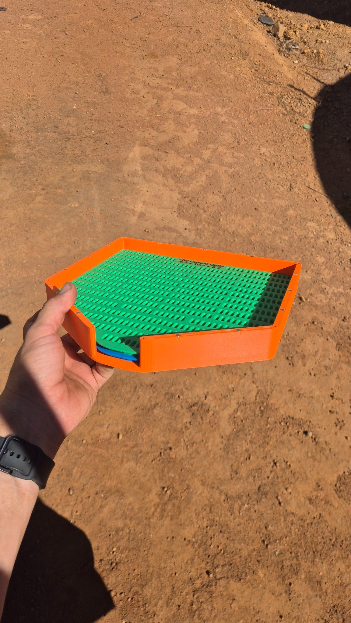 SeedSmart large orange base holding stacked grain counting inserts
