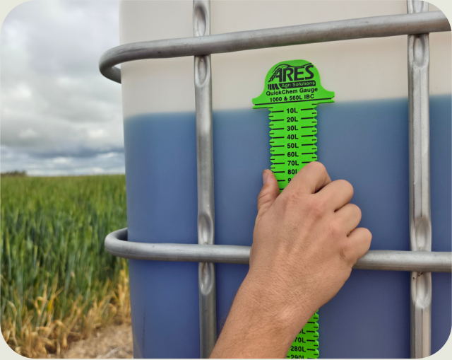 Place the QuickChem gauge arms at the current liquid level.